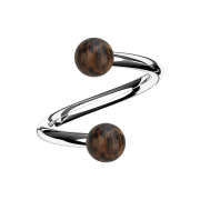 Spirale dargento con due sfere di legno di palma