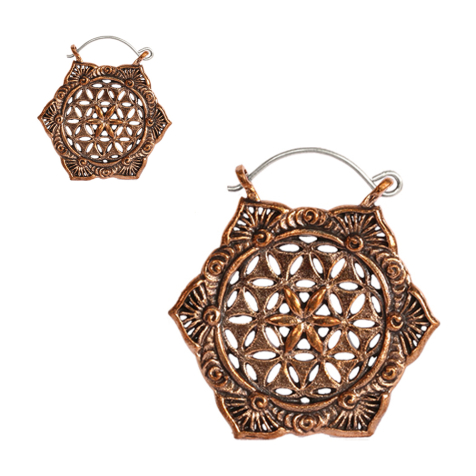 Orecchino in oro rosa con fiore e stella